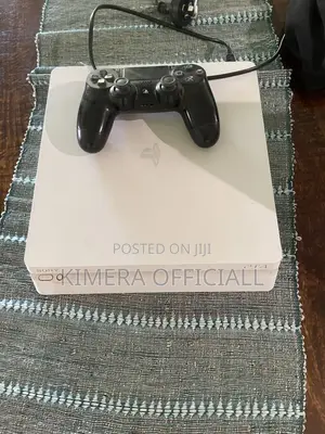 PS4 Slim With 12 Games, 2pads. Your TV Needs This, Please.