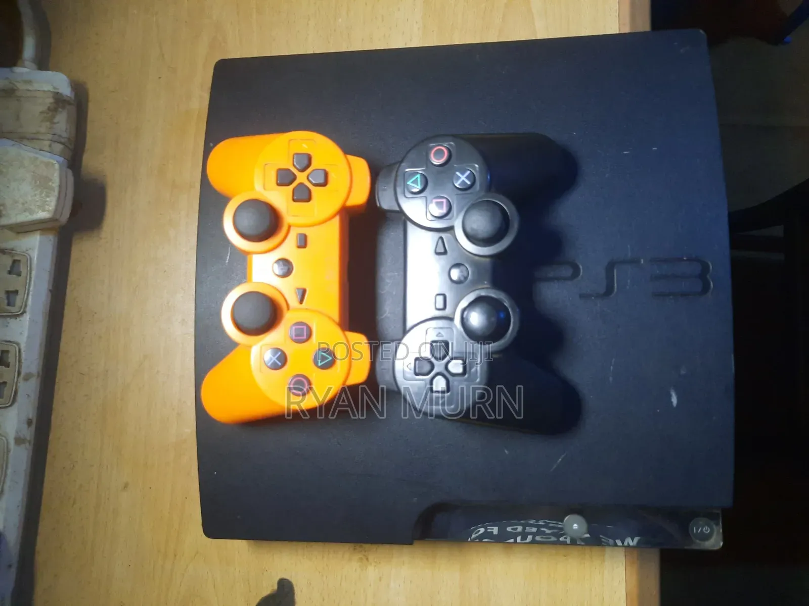 PS 3 Console and 2 Pads
