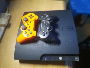 PS 3 Console and 2 Pads