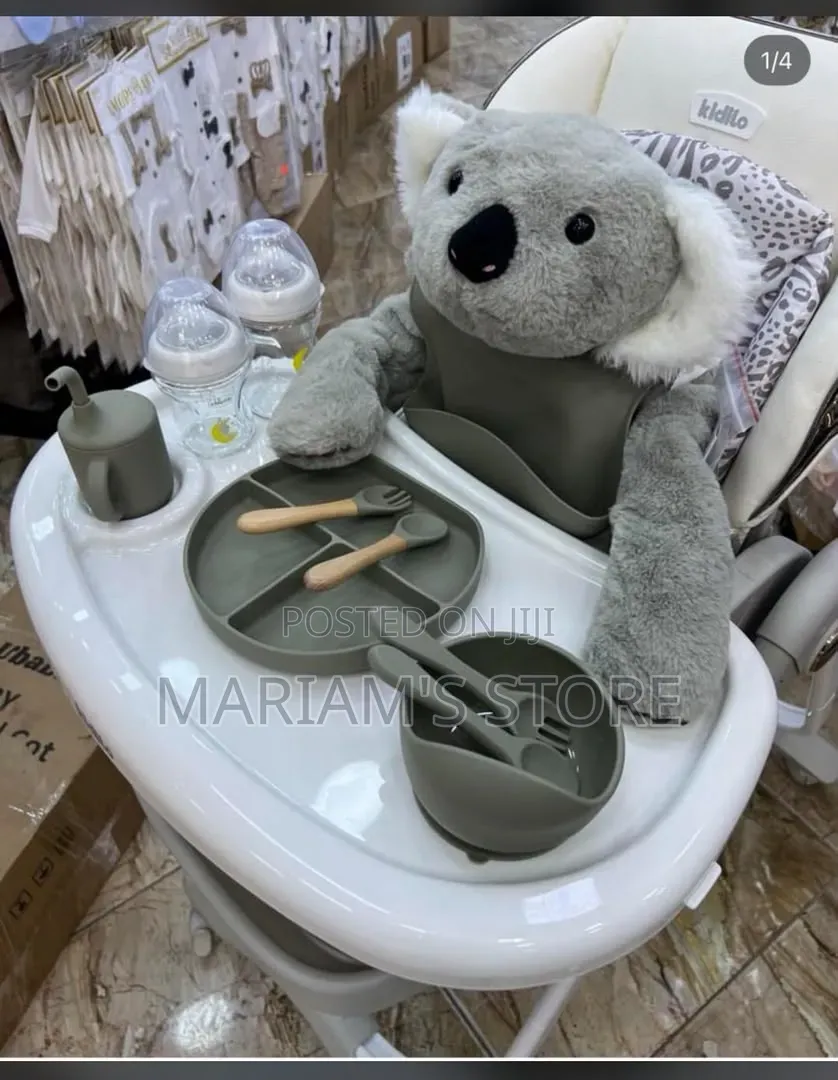 Kidilo Brand Baby High Chair With a Grey Koala Plush Toy Seated With A