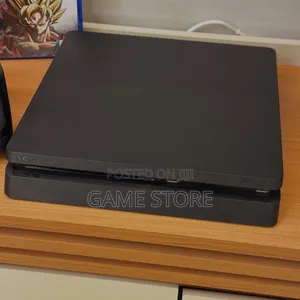 PS4 SLIM WITH 12 GAMES AND 2 PADS. Don't Wait for Miracle Buy It Now