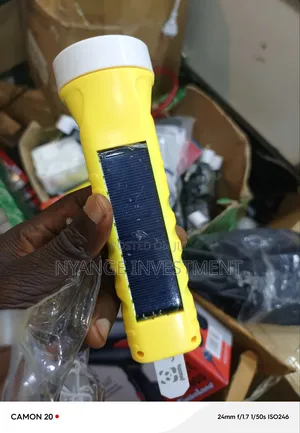 Rechargeable LED Torch Featuring a Built-in Solar Panel for Charging.