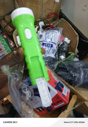 Rechargeable LED Torch Featuring a Built-in Solar Panel for Charging.