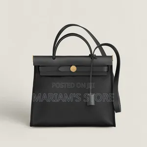 Chris Bella Handbag With a Top-Handle With a Center Clasp Fastenin]