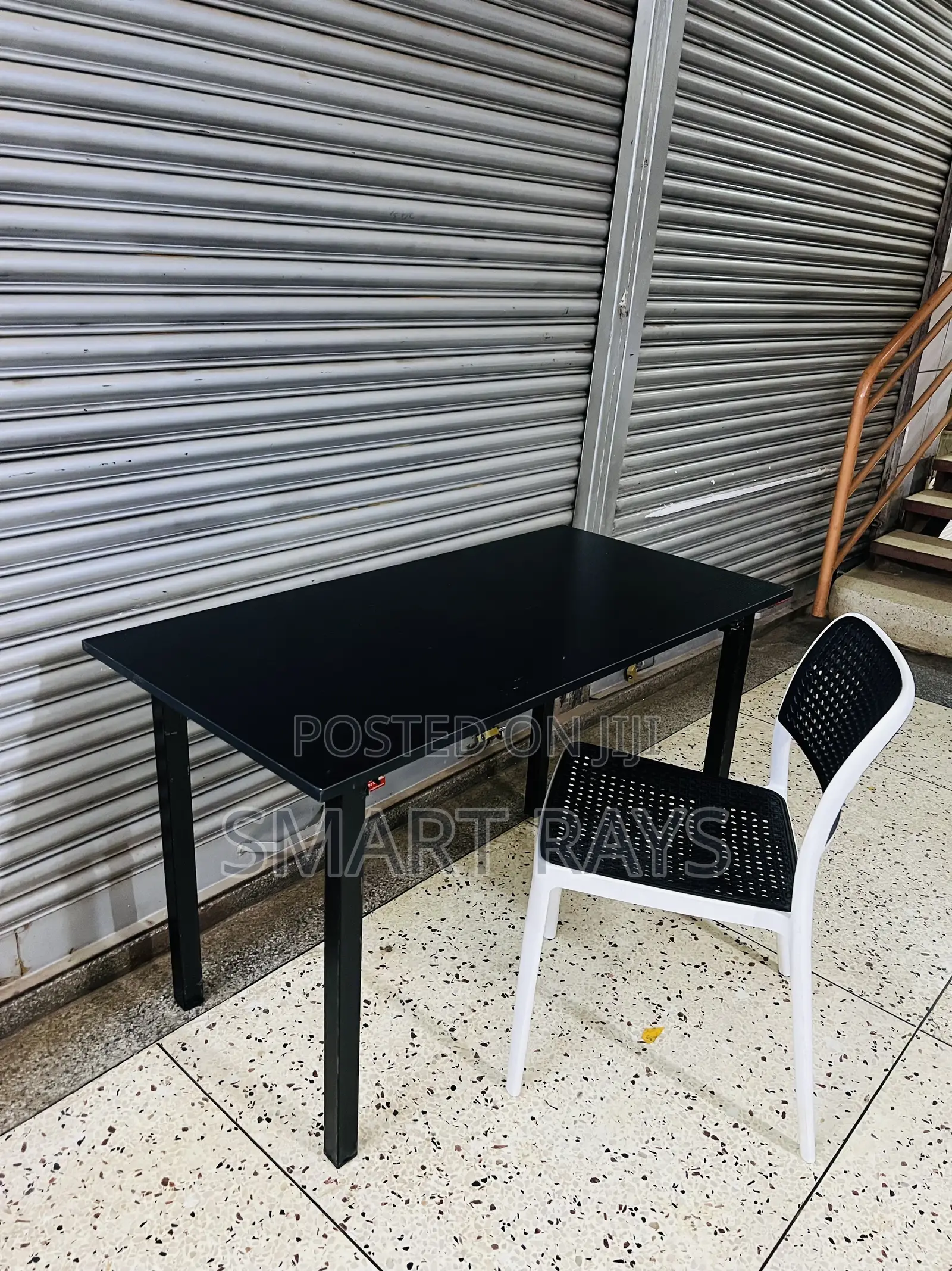 Wooden Reading Table With a Plastic Chair