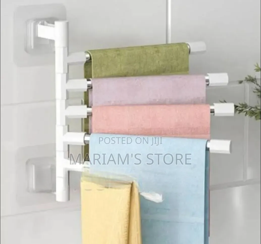 White, Wall-Mounted 5-Bar Swing-Out Towel Rack.