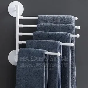 White, Wall-Mounted 5-Bar Swing-Out Towel Rack.
