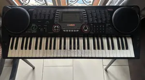 Casio CTK-631 Electronic Keyboard and Stand.