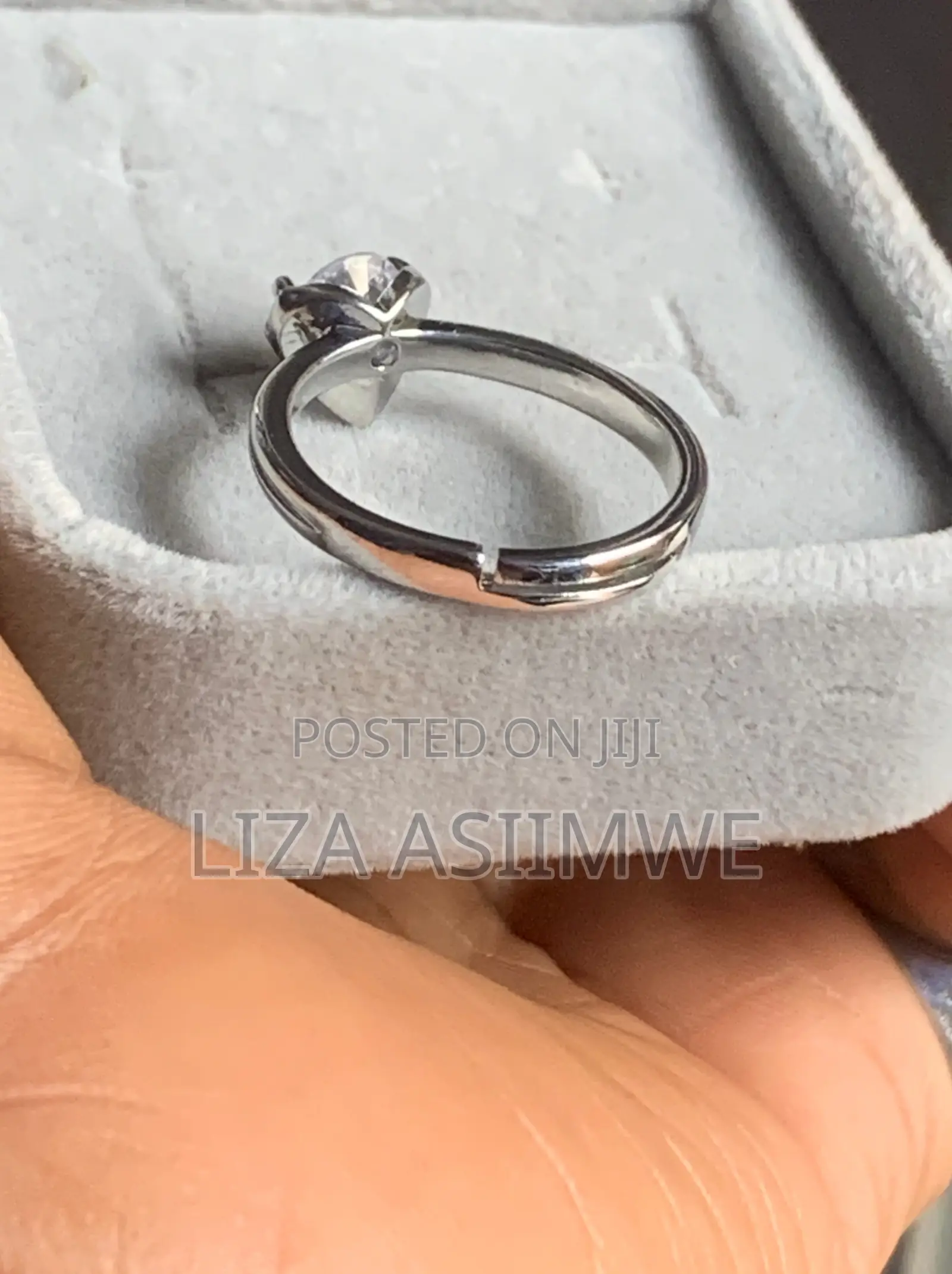 Heart-Shaped White Crystal Set in Stainless Steel Engagement Ring