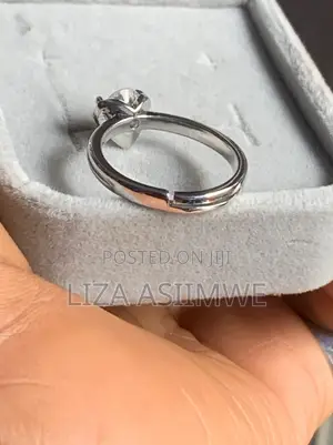 Heart-Shaped White Crystal Set in Stainless Steel Engagement Ring