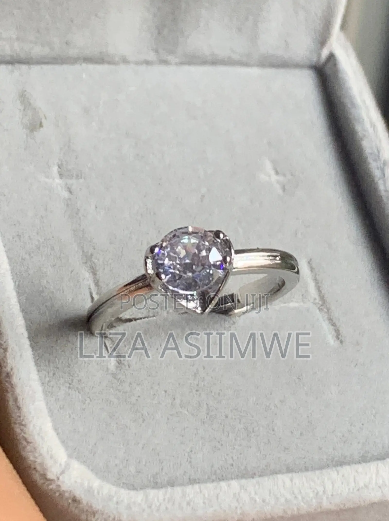 Heart-Shaped White Crystal Set in Stainless Steel Engagement Ring
