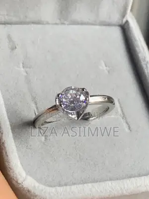 Heart-Shaped White Crystal Set in Stainless Steel Engagement Ring