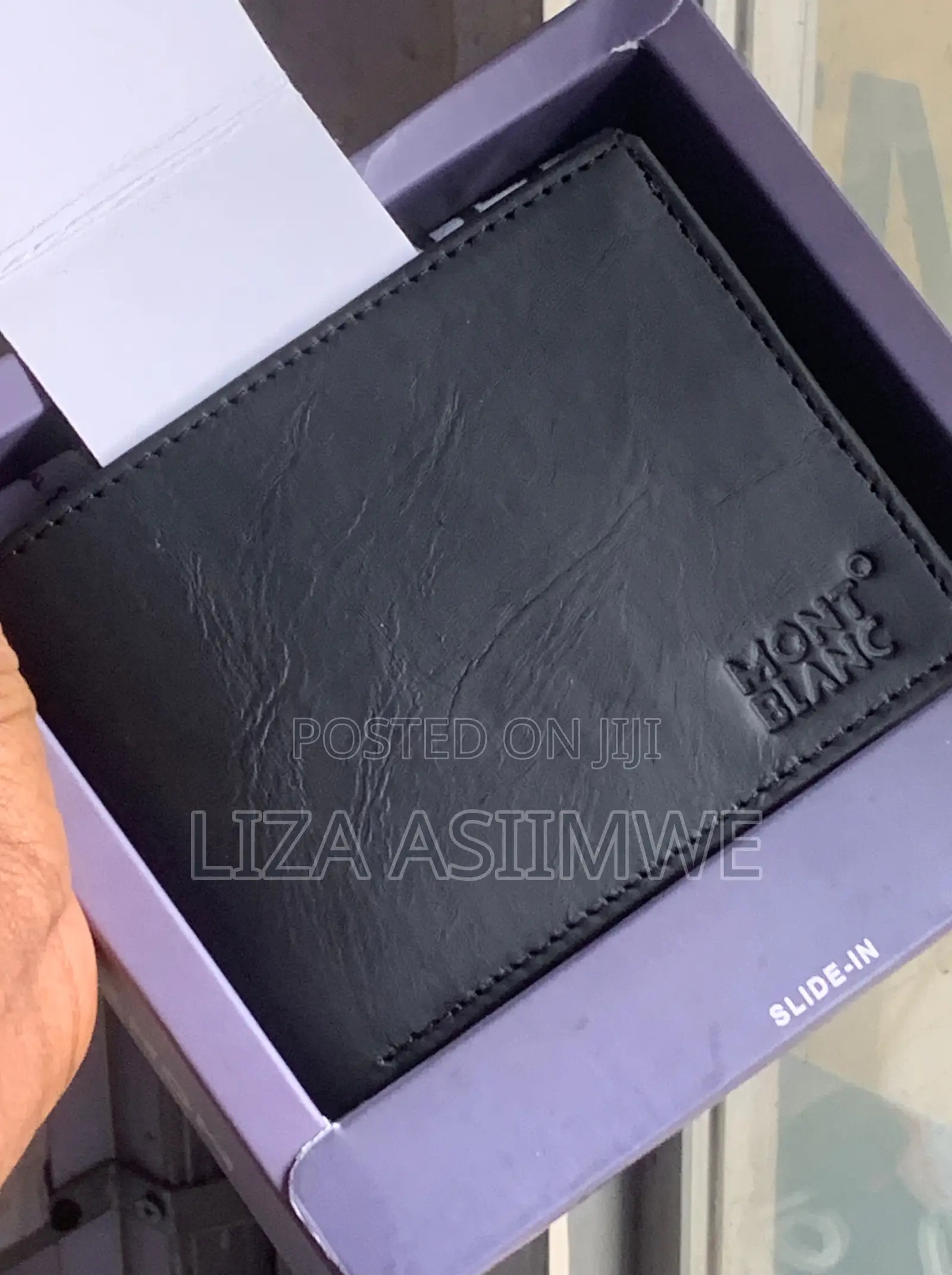 Montblanc Black Leather Wallet Featuring a Stamped Brand Logo On