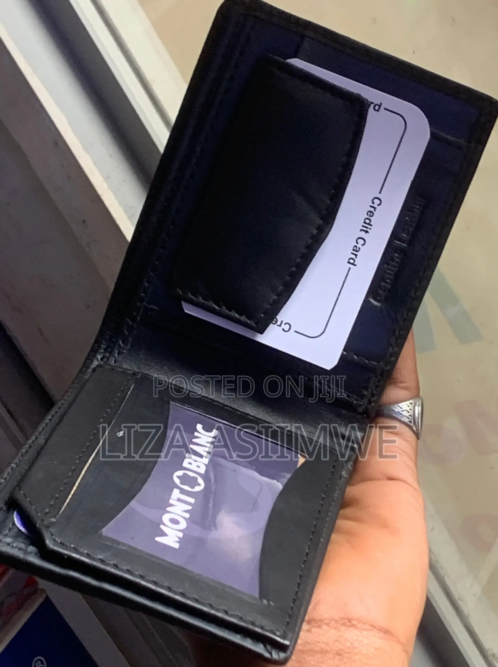 Montblanc Black Leather Wallet Featuring a Stamped Brand Logo On