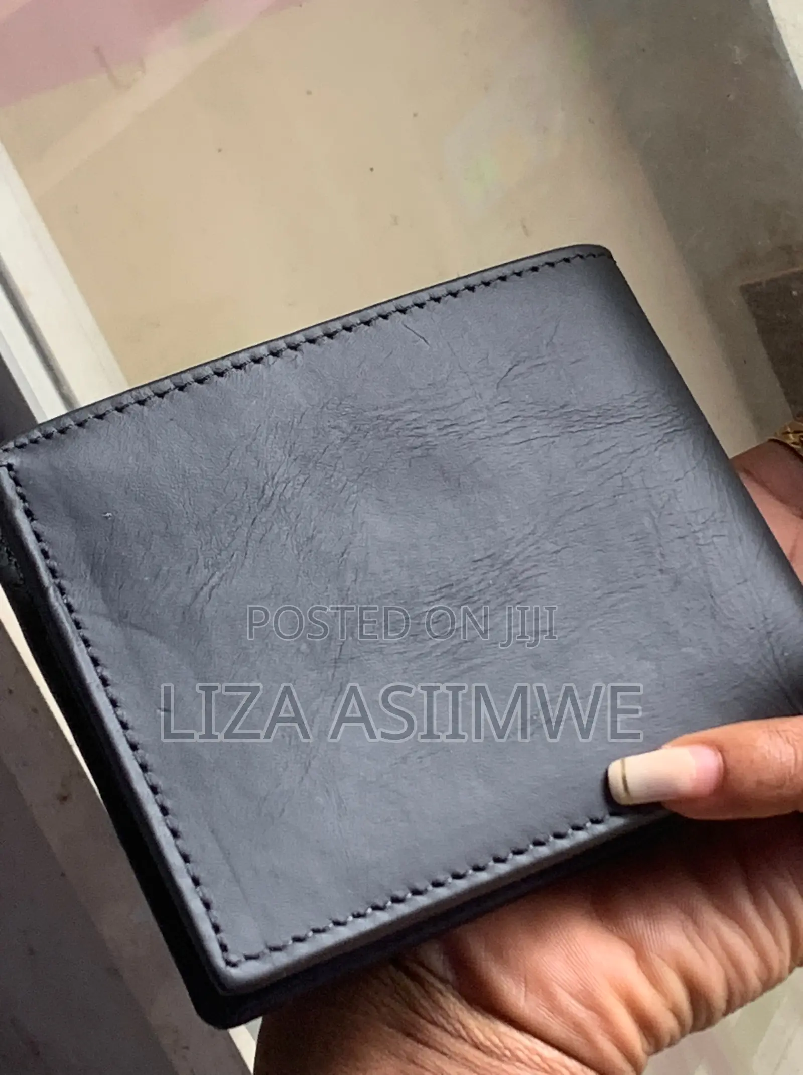Montblanc Black Leather Wallet Featuring a Stamped Brand Logo On