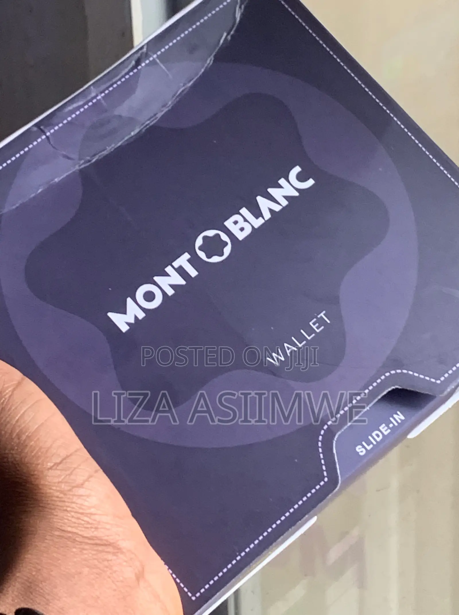 Montblanc Black Leather Wallet Featuring a Stamped Brand Logo On