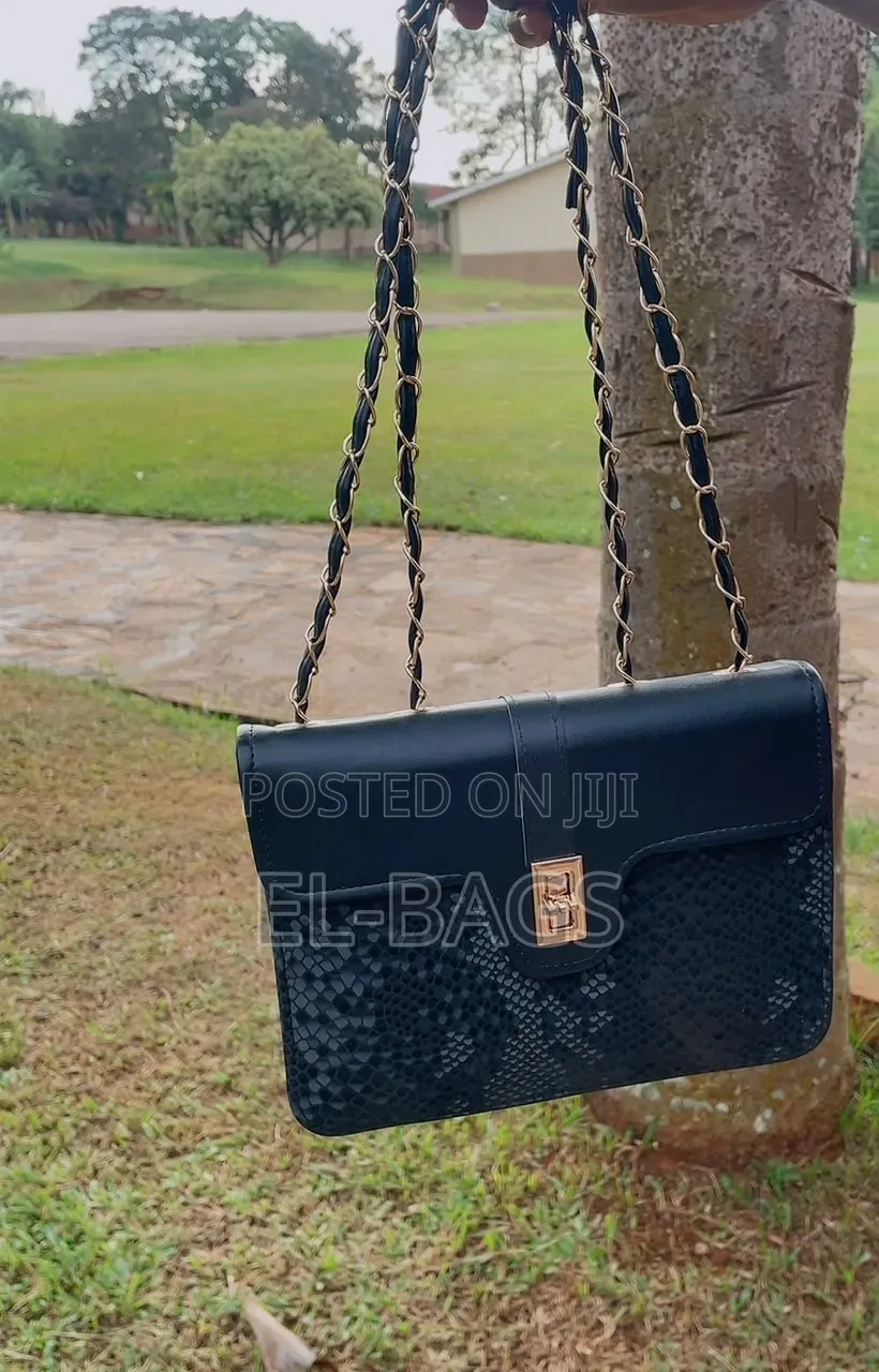 The Structured Black Python Shoulder Bag