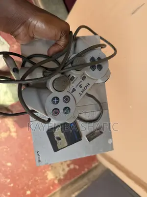 Satin Silver Sony PS2 Slim Console With Controller Memory Card