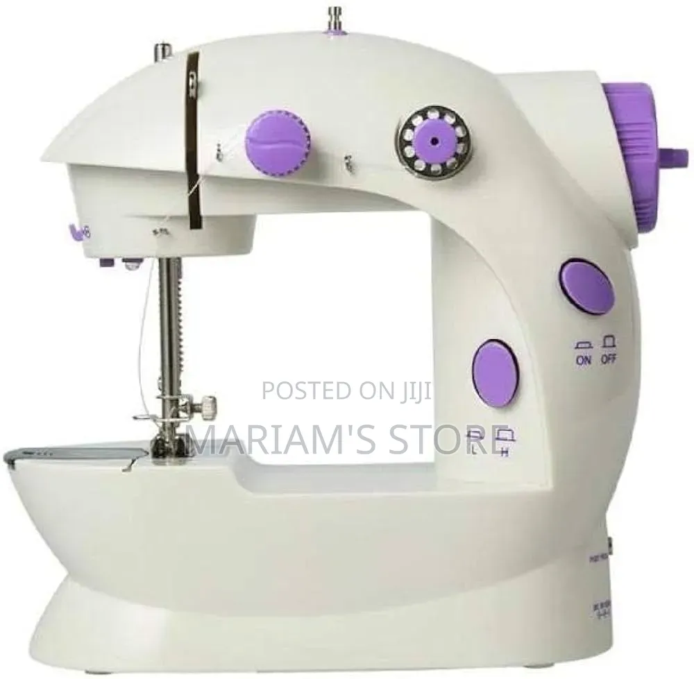 Mini Sewing Machine Featuring a Purple and White Design.