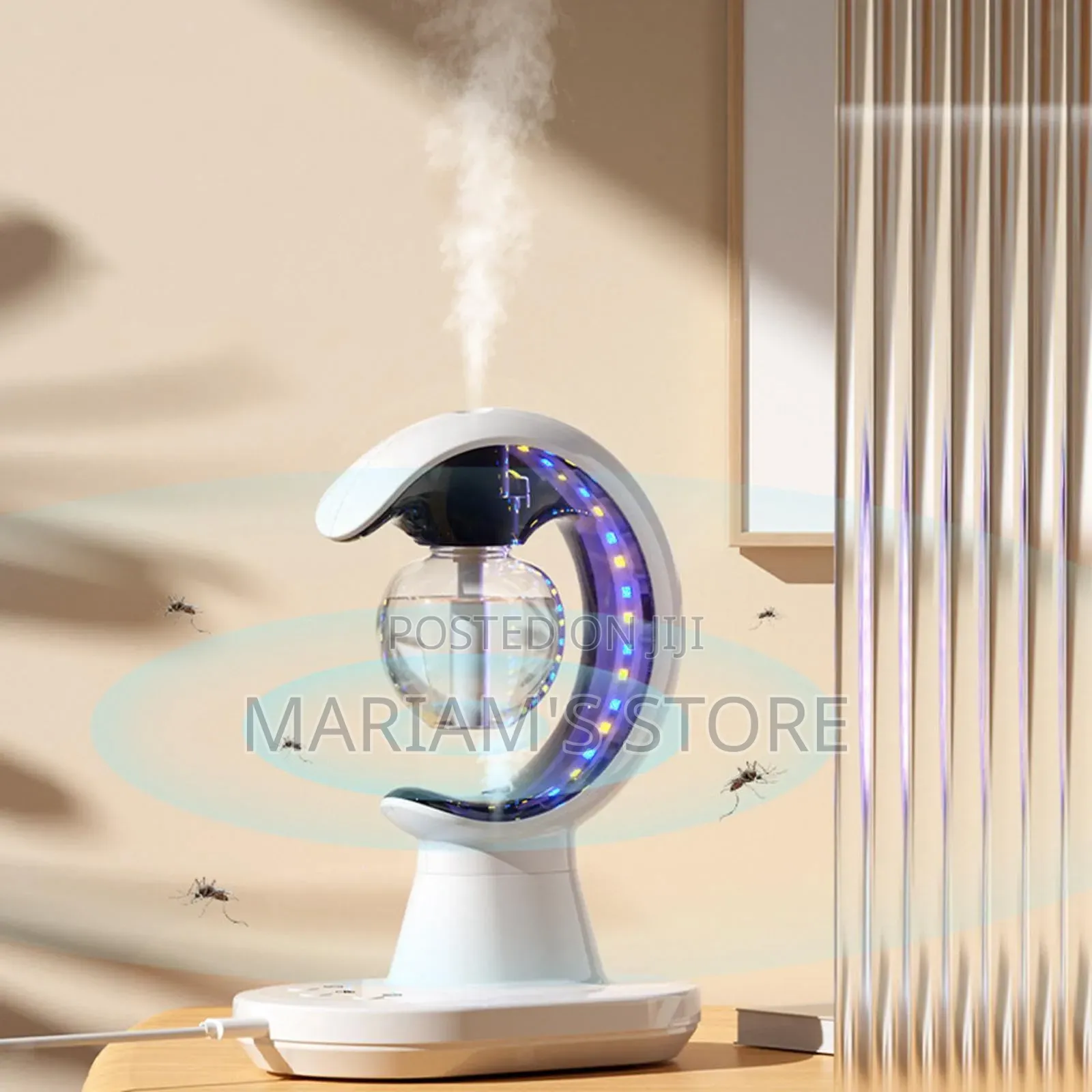 White 3-in-1 Humidifying Light Intelligent Mosquito Repeller.