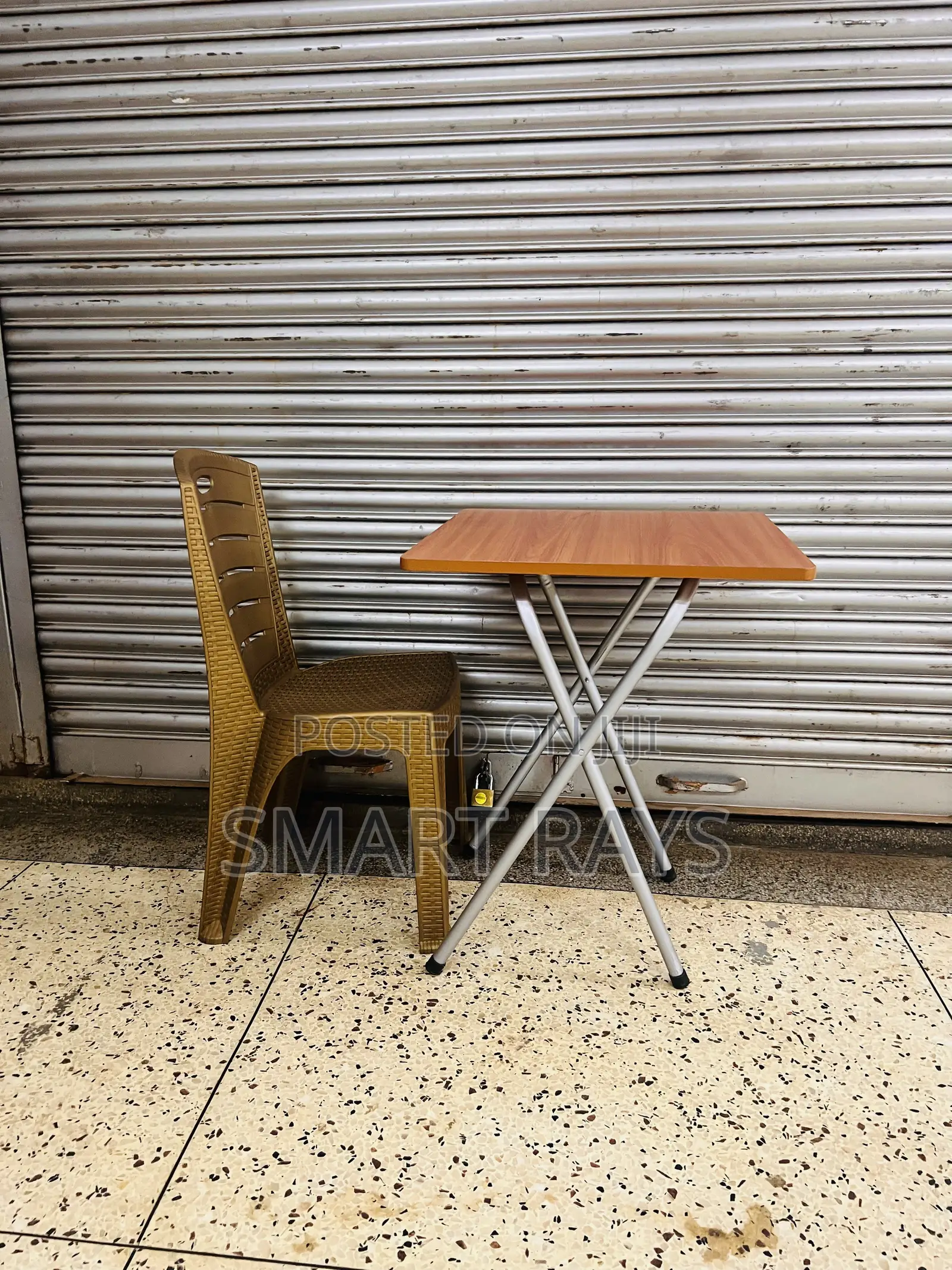 Cocktail Folding Wooden Table and a Plastic Chair