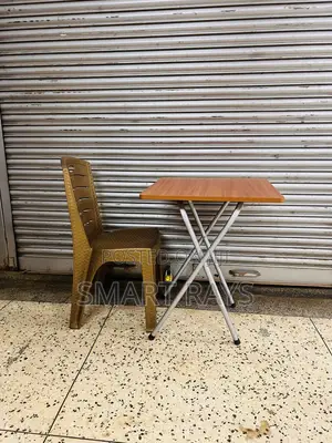 Cocktail Folding Wooden Table and a Plastic Chair