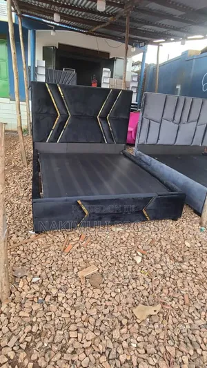 5 by 6 Black Bed With Arrow Stickers