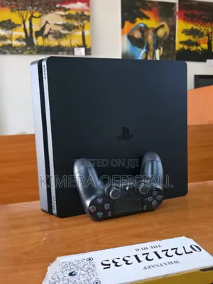Super Clean Chipped PS4 Slim - 2 Controllers 12 Games.