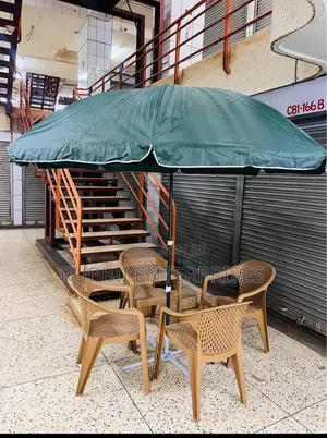 Round Patio Umbrella With Four Chairs