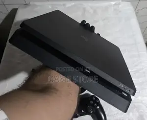 PS4 Fat Chipped, 12 Games + 2 Pads, UGX, EM Plaza Room 202