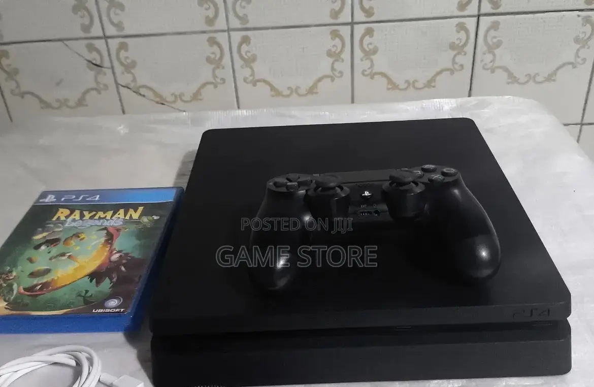 PS4 Fat Standard, 12 Games, 2 Pads, UGX, EM Plaza Deal