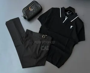 Polo Shirt Paired With Sleek, Belt-Less Trousers.