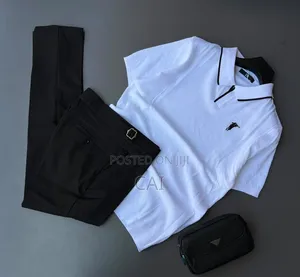 Polo Shirt Paired With Sleek, Belt-Less Trousers.