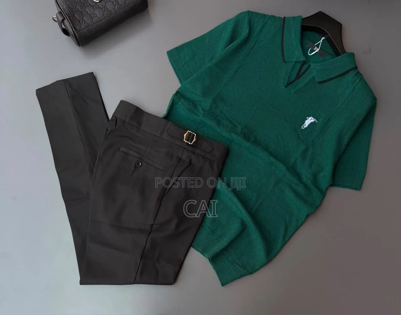 Polo Shirt Paired With Sleek, Belt-Less Trousers.