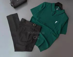 Polo Shirt Paired With Sleek, Belt-Less Trousers.