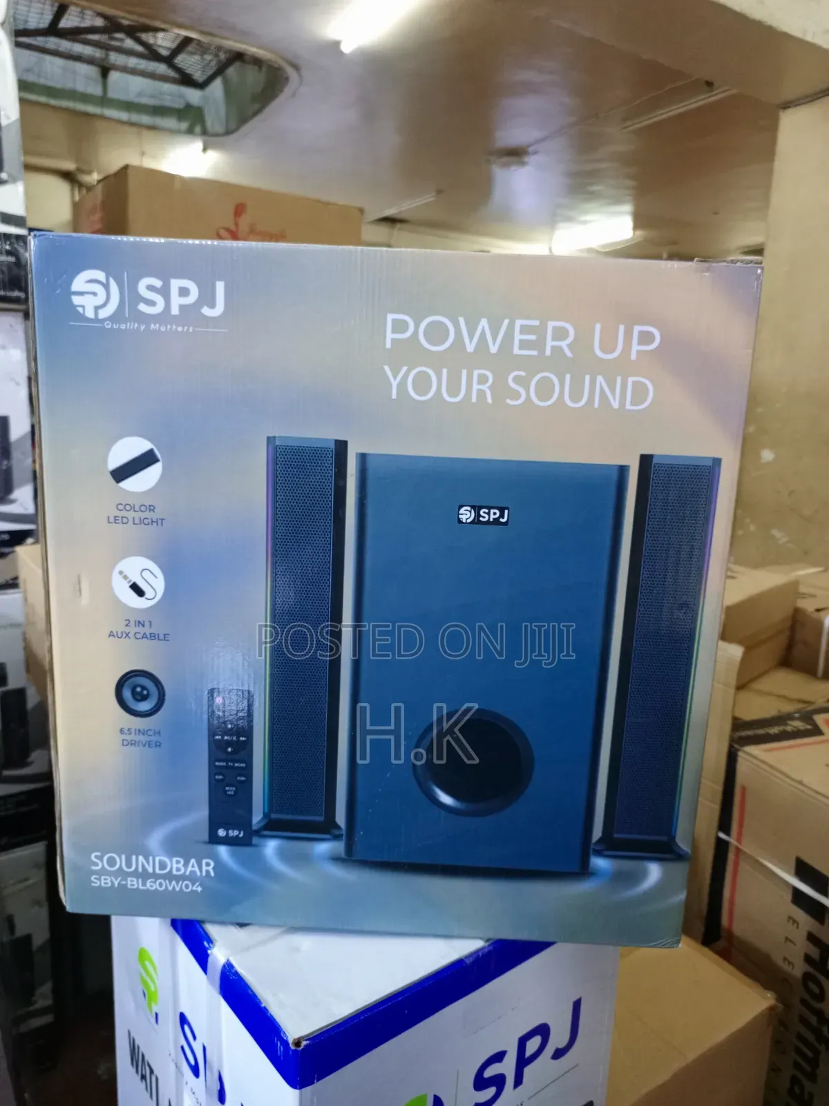 SPJ SBY-BL60W04 Soundbar System, a 2.1 Channel Audio Setup.
