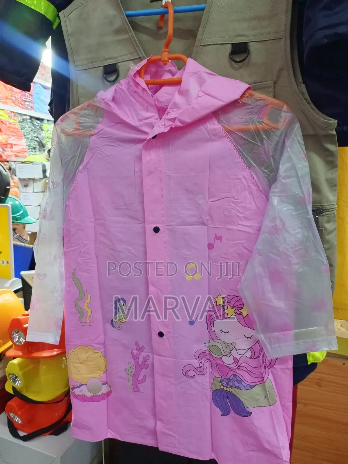 Pink Mermaid-Themed Children's Raincoat With Transparent Sleeves.