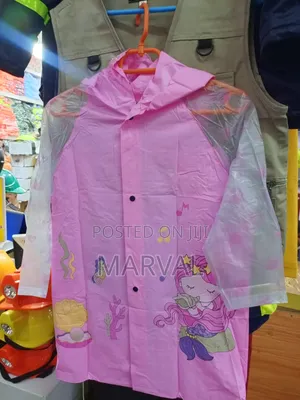 Pink Mermaid-Themed Children's Raincoat With Transparent Sleeves.