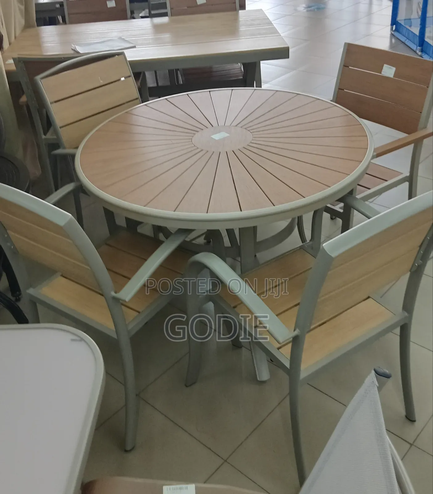 5-Piece Outdoor Patio Set With Wood-Look Top and Four Chairs.