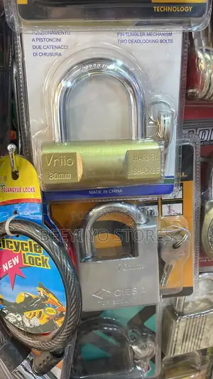 Heavy-Duty Brass-Finished Padlock With a Hardened Shackle.