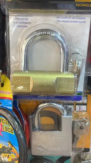 Heavy-Duty Brass-Finished Padlock With a Hardened Shackle.