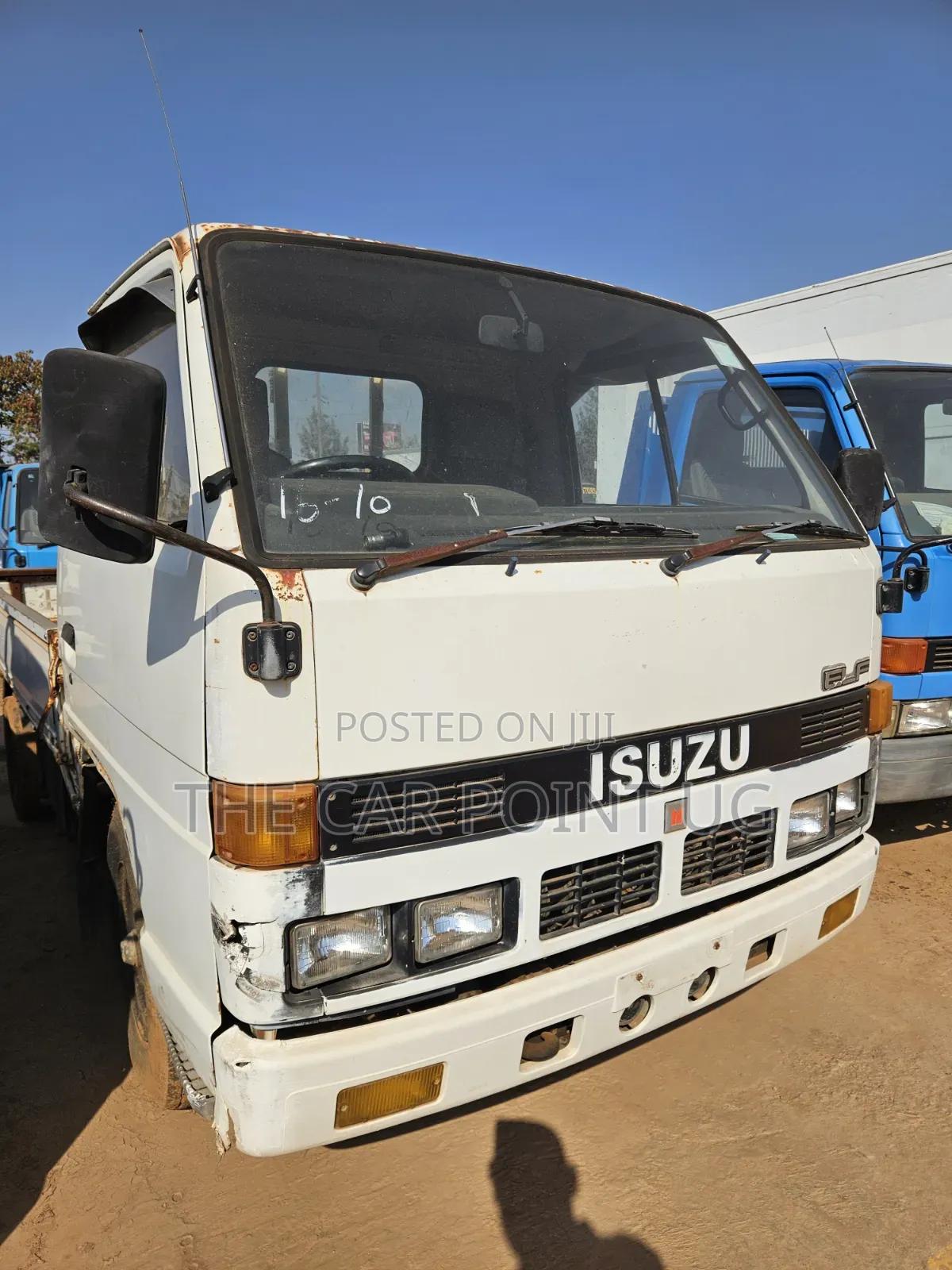 Isuzu Elf Truck Low Bed White