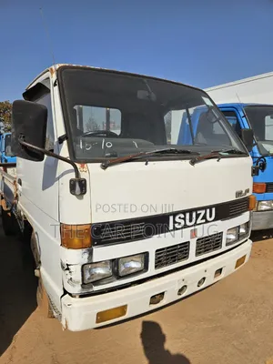 Isuzu Elf Truck Low Bed White