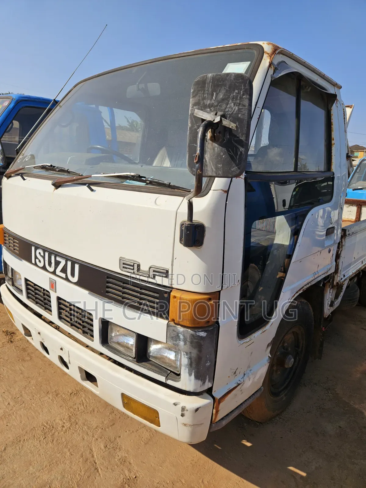 Isuzu Elf Truck Low Bed White