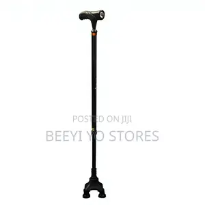 Quad-Base Adjustable Walking Cane With an Integrated LED Flashlight.