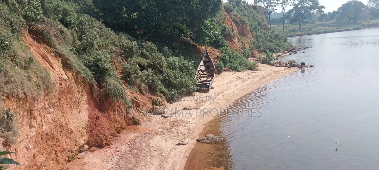 Two Acres Measuring Direct From Lake on Quicksale in Nkumba Kasanyi