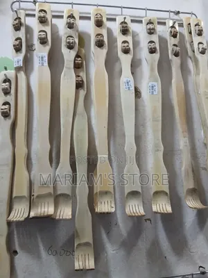 Bamboo Back Scratchers With Integrated Roller Massagers.