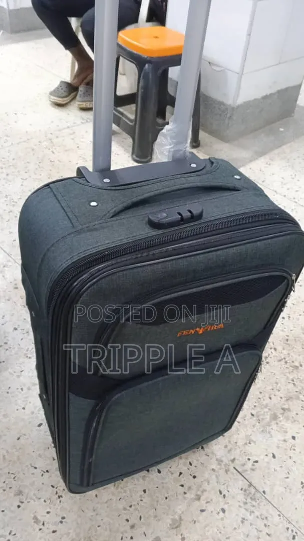 A Meduim Suitcase Feng Hua With Orange Branding