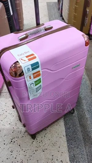A Pink Early Bird Hard-Sided Spinner Suitcase ( Big)