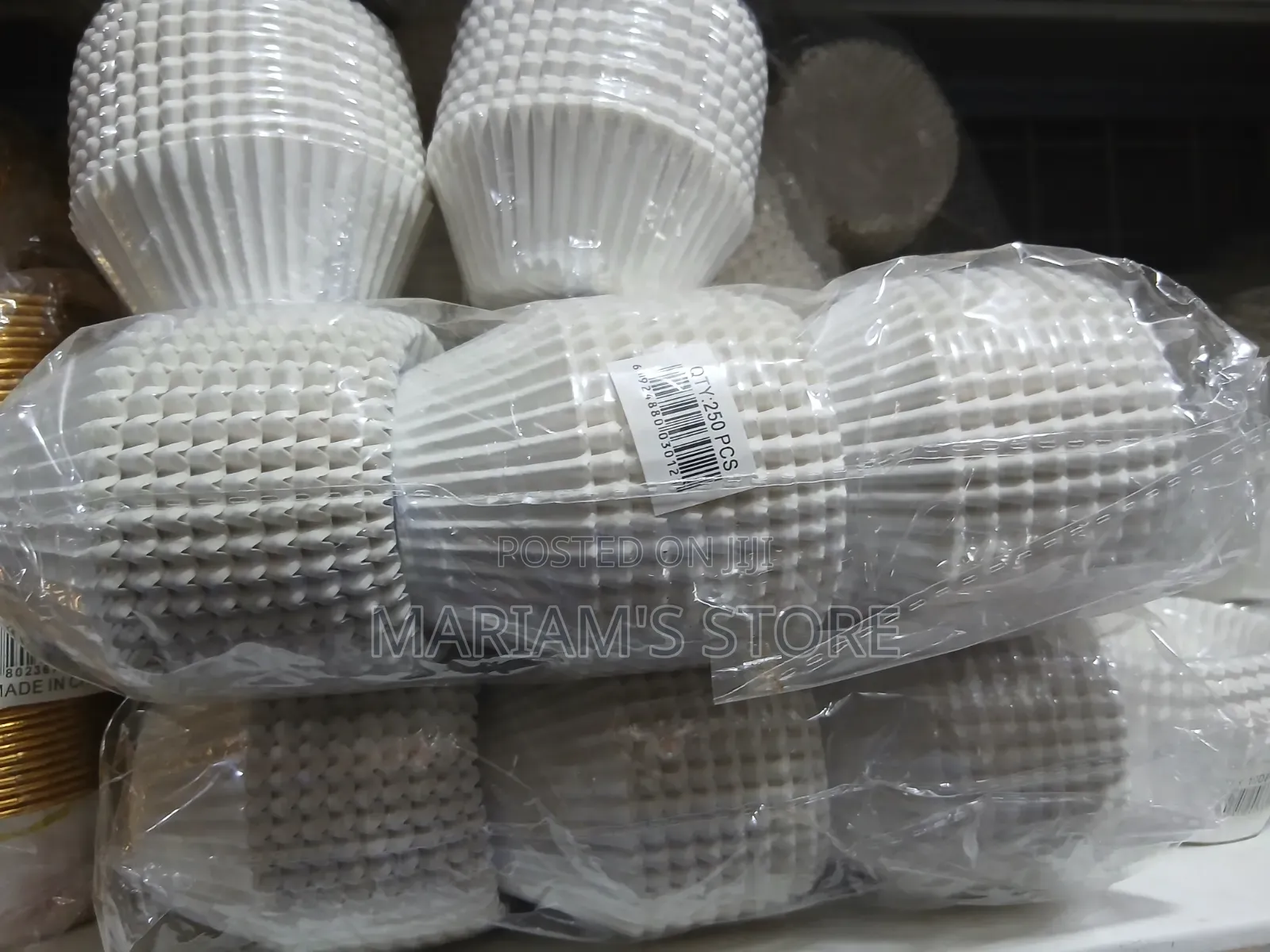 White Cupcake Liners, Packaged in Sets of 250 Pieces.